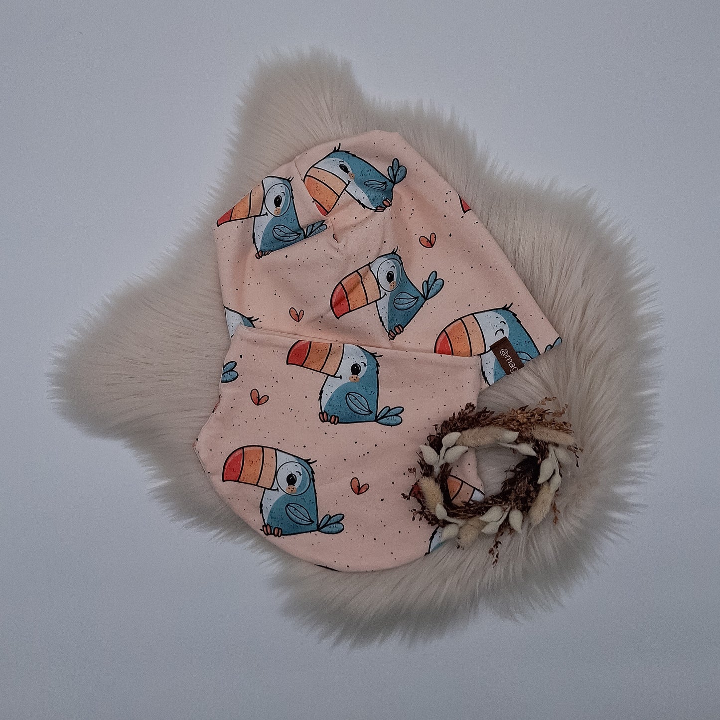 Beanie und Loop Tukan
