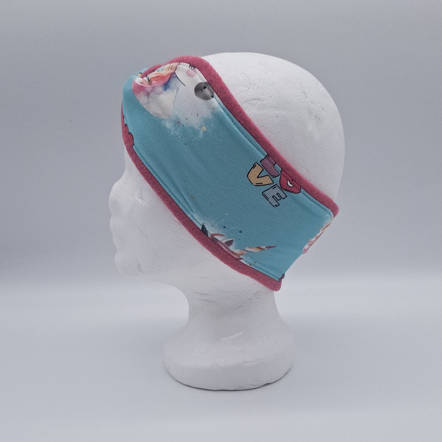 Fleece Stirnband Einhorn hell