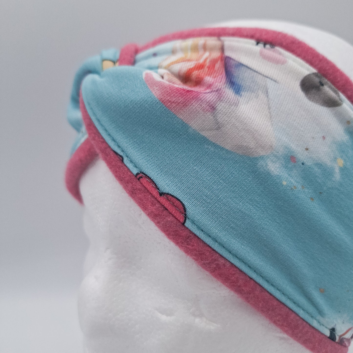 Fleece Stirnband Einhorn hell