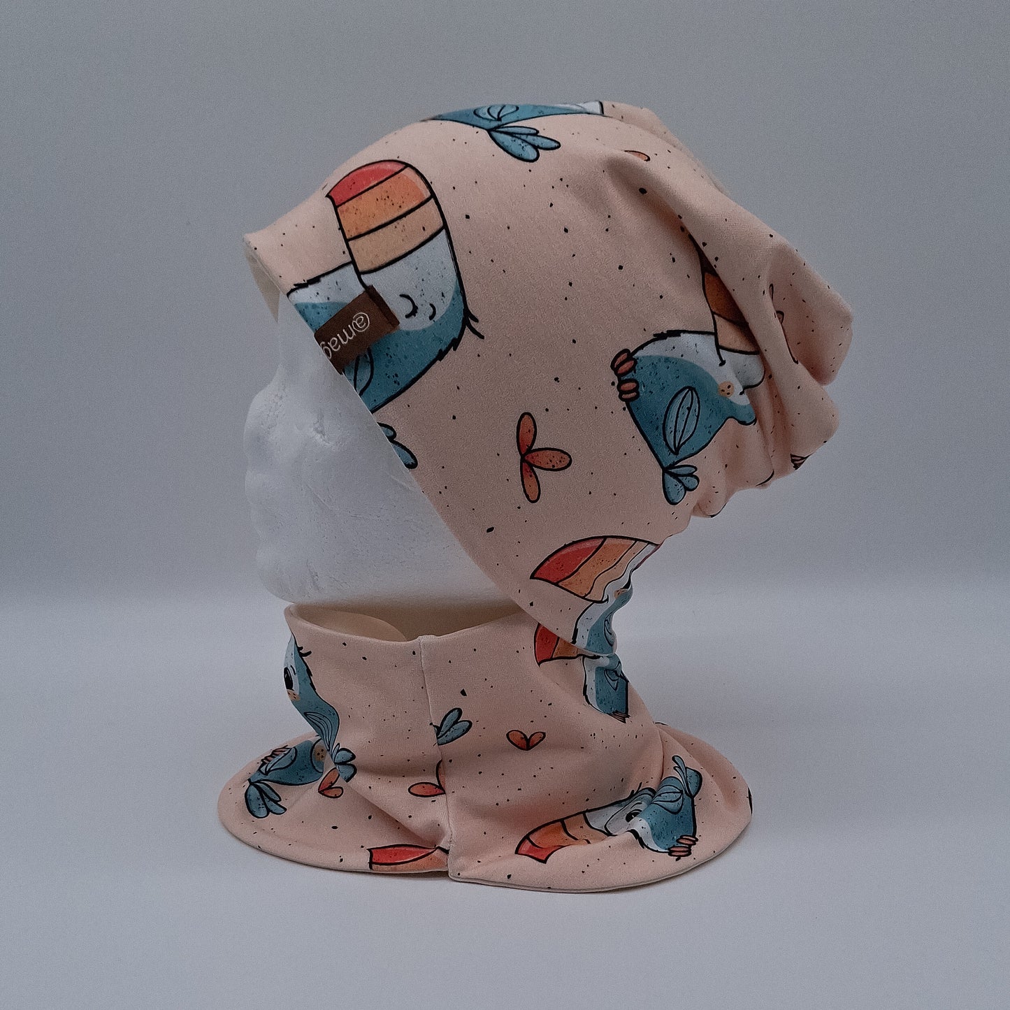 Beanie und Loop Tukan
