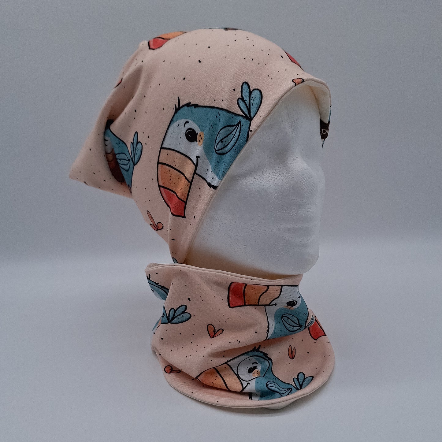 Beanie und Loop Tukan