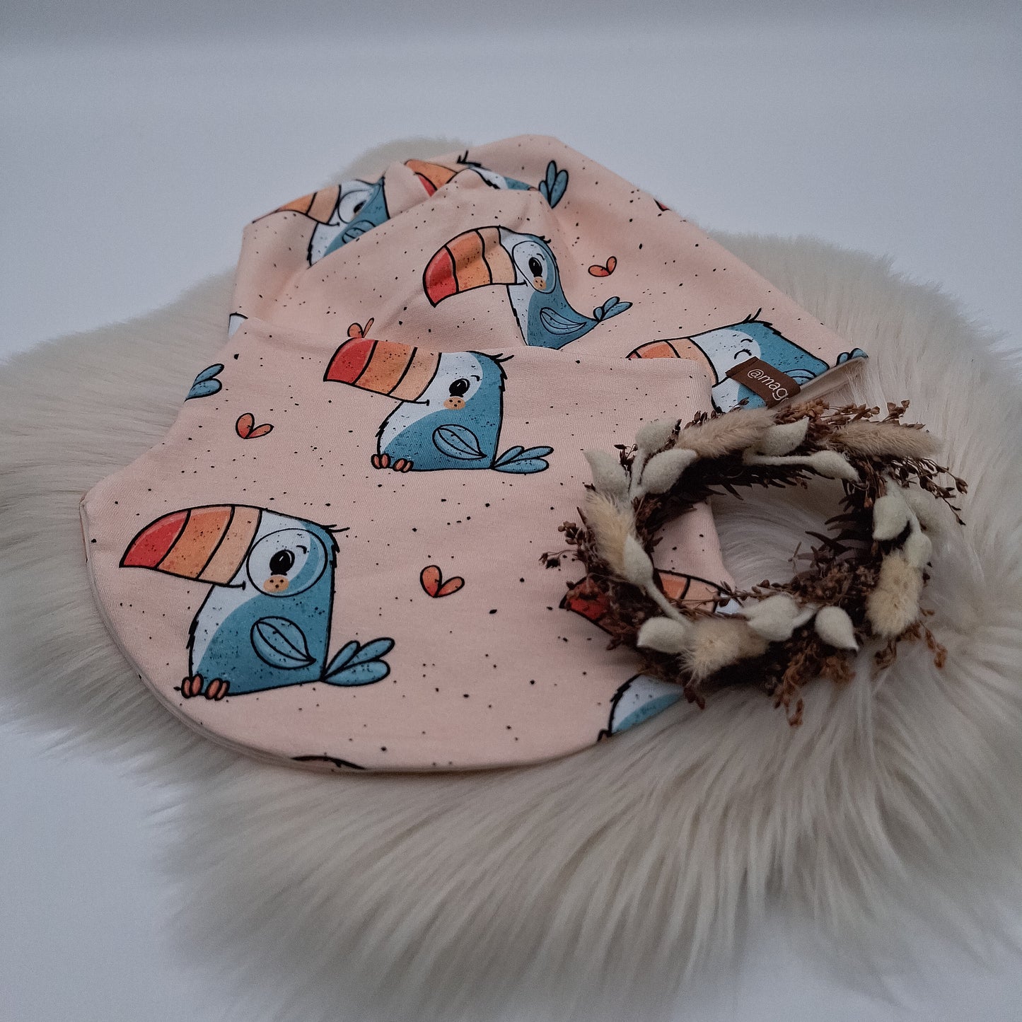 Beanie und Loop Tukan