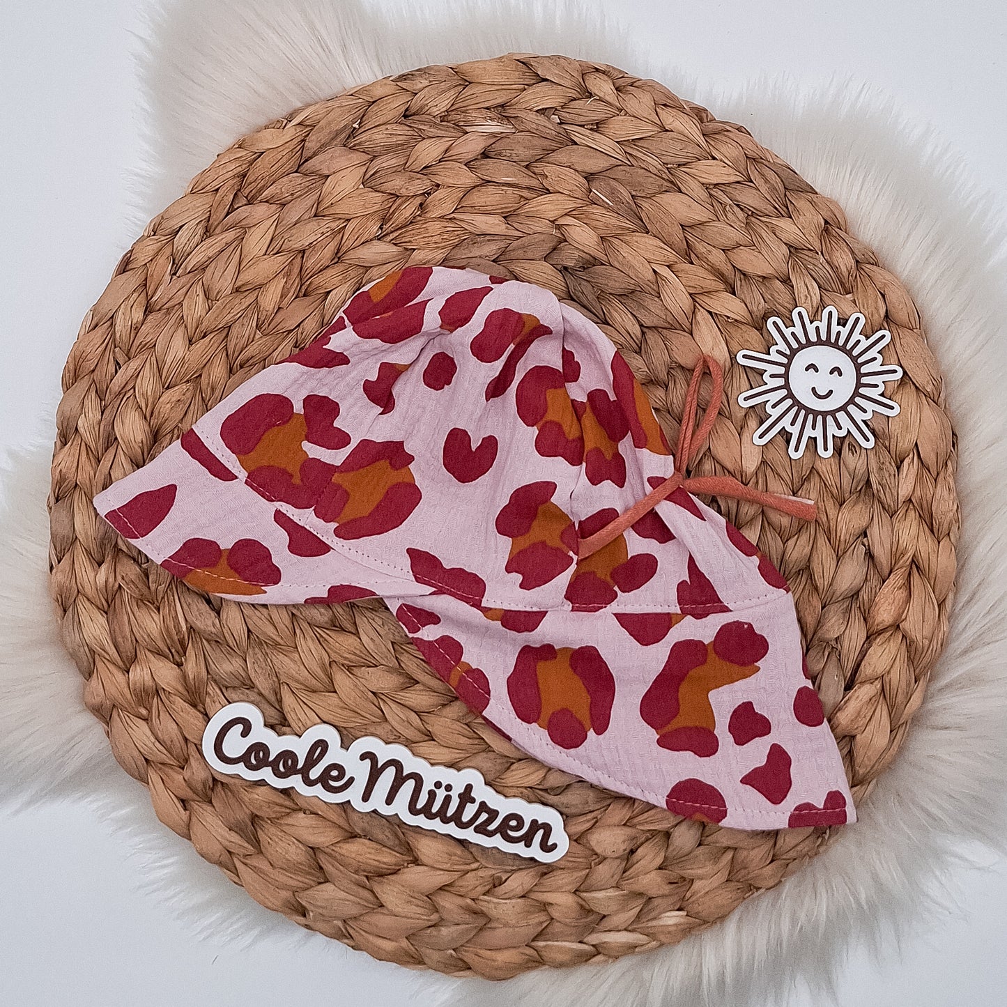 Sonnenhut Musselin Leo Beere